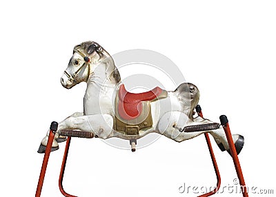 Old childâ€™s spring hobby horse isolated Stock Photo